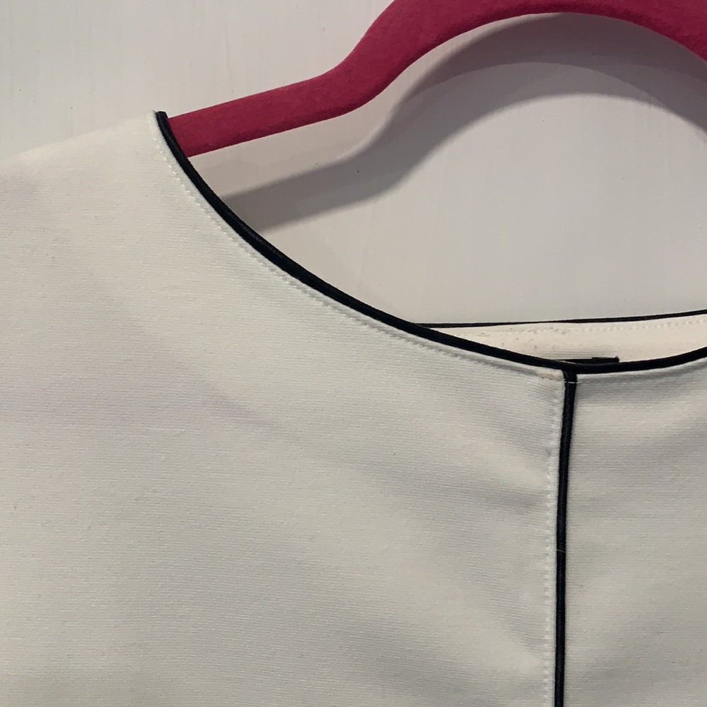 Cream blouse with black piping